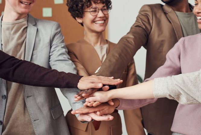 Photo Of People Holding Each Other's hands