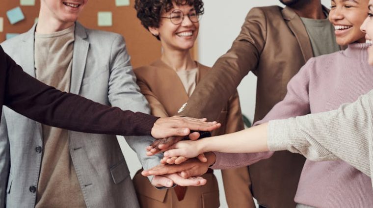 Photo Of People Holding Each Other's hands