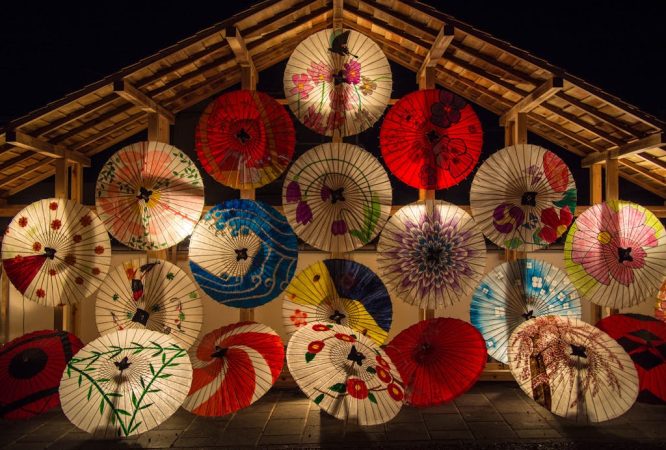 Red and White Umbrella during Night Time