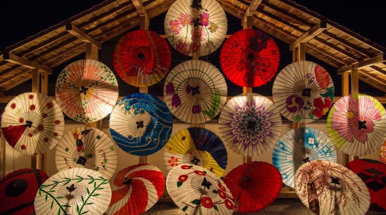 Red and White Umbrella during Night Time