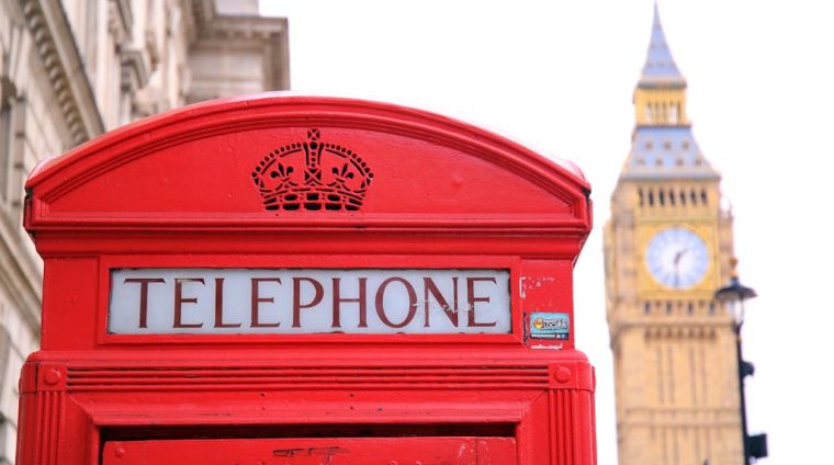 Red Telephone Booth in Front of Big Ben