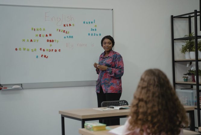 Woman Teaching English in Class